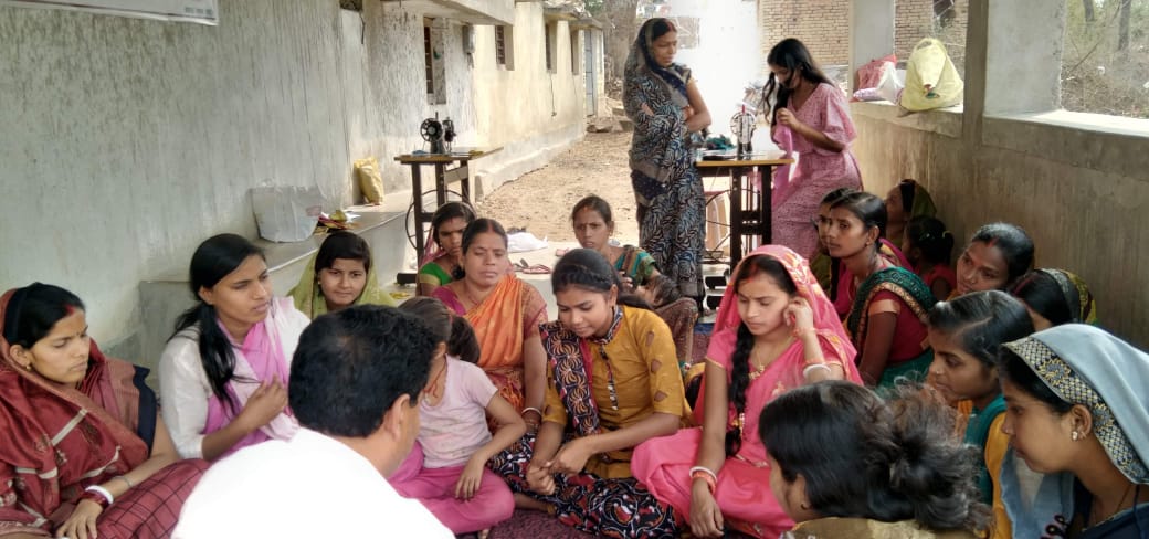 Participants take part in group work during sewing training