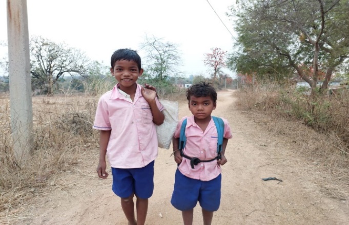 Aditya walks to school with a friend