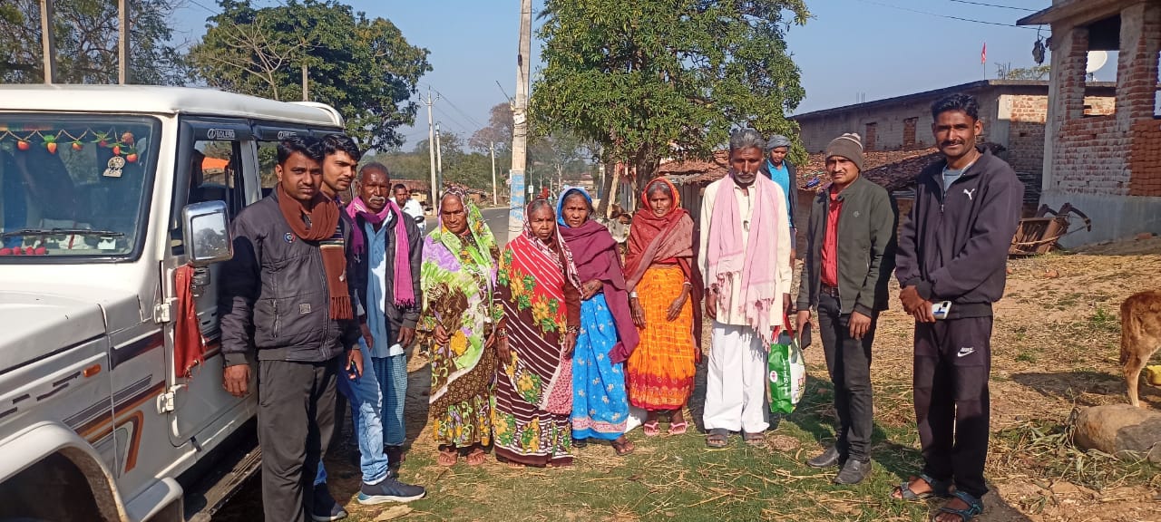 Residents prepare to travel from the village to the hospital